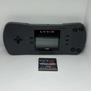 Console portatile Atari Lynx 1990 V1 senza scatola con 1 gioco (rara!) Perfettamente funzionante! - Foto 1 di 13