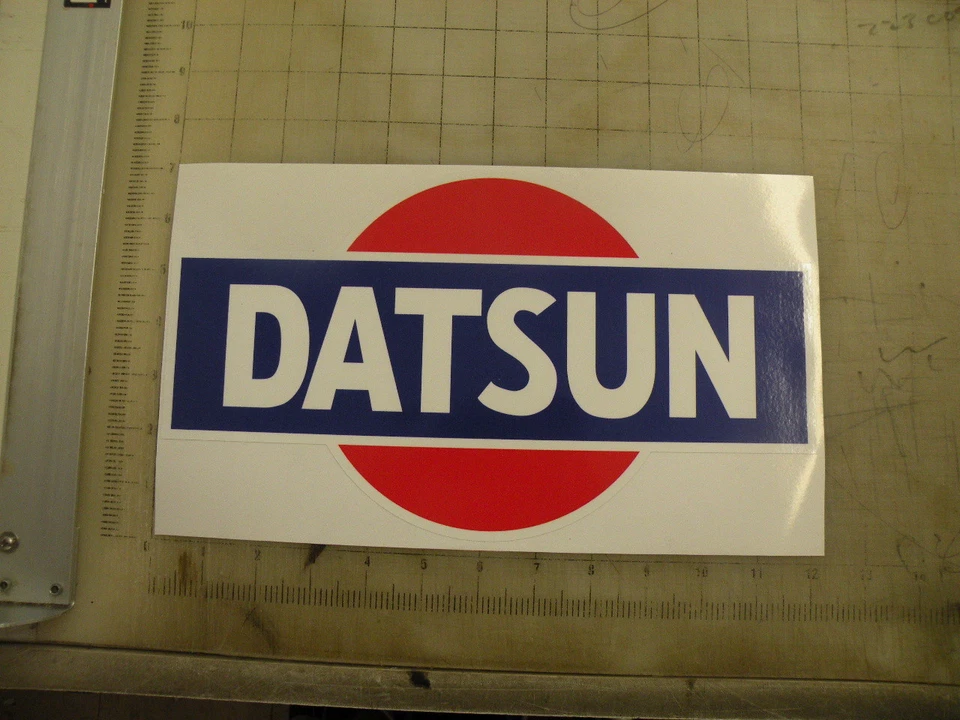 Vintage Datsun 1976 red/wht/blue sticker decal 12"x6.8" - Image 1 of 1