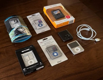 TWO Apple iPod Nano 3rd Gen-8GB Bundle-Tested-in cases + 5 New Protective Cases - Image 1 of 4
