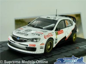 SUBARU IMPREZA WRC MODEL CAR 2010 RALLY PORTUGAL OSTBERG 1:43 SCALE IXO K8 - Picture 1 of 5