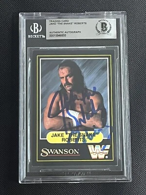 JAKE “THE SNAKE” ROBERTS 1991 SWANSON WWF SIGNED AUTOGRAPHED CARD BAS AUTHENTIC - Image 1 of 2