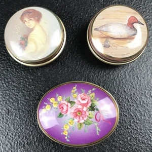 Juego de 3 latas de caramelo pequeñas vintage. Mujer, pato y flores. - Imagen 1 de 9