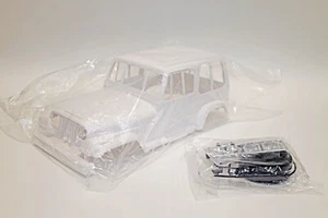 Tamiya Jeep Wrangler Yj Body H J Juego de 2 piezas Tamiya RC Shop compras - Imagen 1 de 8
