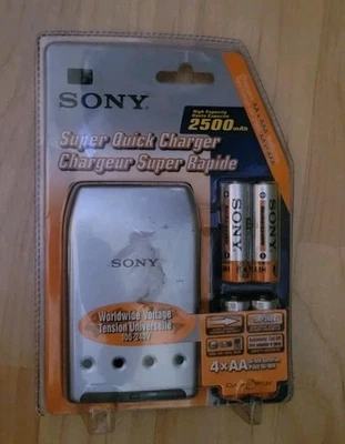 Cargador de batería Sony vintage con 4 pilas recargables AA Ni-MH (BCG-34HE4) Foto 1 de 2