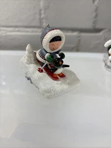 2009 Hallmark Keepsake Ornament - Frosty Friends - Eskimo Skiing - Picture 1 of 3