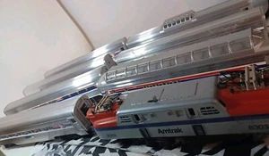 Lot Of Lionel Amtrak 6-18303 GG-1 Loco, Passenger Cars 9100 To 9107 With Boxes - Picture 1 of 24