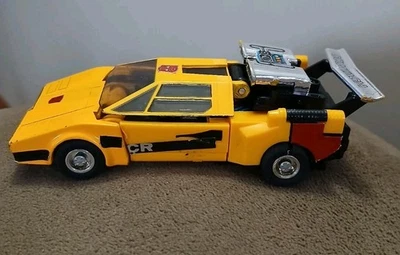 TRANSFORMER Sunstreaker Action Figure G1 Takara Autobot Yellow Lamborghini Car - Image 1 of 4