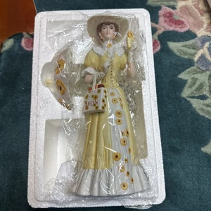 AVON 2012 MRS. ALBEE PRESIDENT'S CLUB AWARD Porcelain SUNFLOWER LADY w/ UMBRELLA - Picture 1 of 4