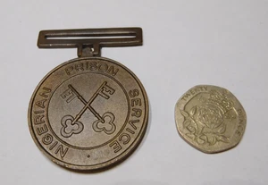 Nigerianische Gefängnisdienstmedaille sehr guter Zustand ungewöhnlich selten lange gute Führung afrikanischer Ausländer - Bild 1 von 2