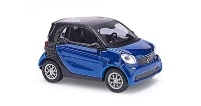 Scaletta H0 1:87 Busch 50700 Smart Forfour Coupé »CMD-Collection« Nuovo OVP - Immagine 1 di 2