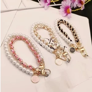 Leather Pearl Phone Lanyard Camellia Mobile Phone Charm Bracelet Chain - Photo 1 sur 9