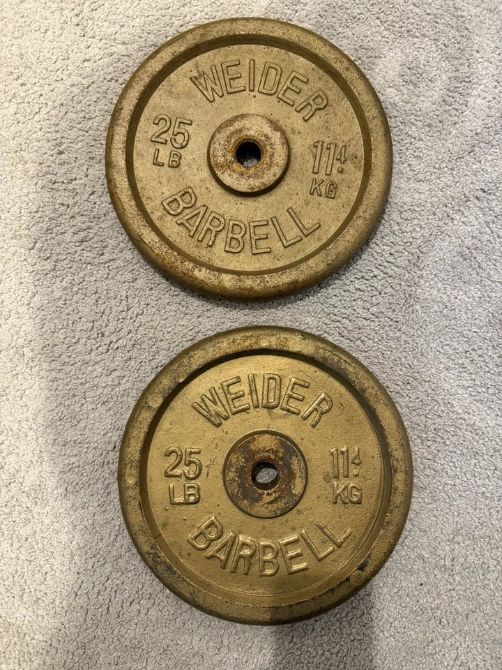 Par de placas de peso vintage WEIDER de 25 libras de peso ORO 50 libras en total Foto 1 de 4