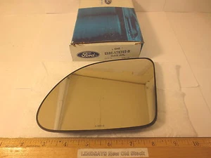 FORD 1986/1988 TAURUS & MERCURY SABLE L.H. GLASS ASSY (OUTSIDE REAR VIEW MIRROR) - Picture 1 of 4