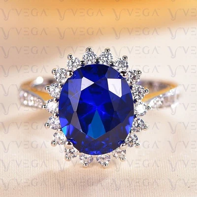 5.60 克拉椭圆形切割天然蓝宝石和钻石女式戒指 950PT 镀铂 — 第 1/4 张图片