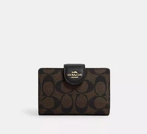 Portafoglio Coach Signature nero/marrone medio con zip angolare firmato C0082 - Foto 1 di 3