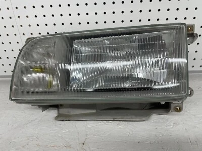 MONTAJE FARO DELANTERO IZQUIERDO 1993 JDM RHD TOYOTA HIACE HI ACE VAN LH107 OEM Foto 1 de 4