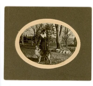 Antique photo  woman posing with pet dog - Picture 1 of 3