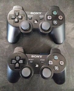 Pair of Sony PlayStation DualShock 3 Wireless Controllers - Black (CECHZC2U ) 