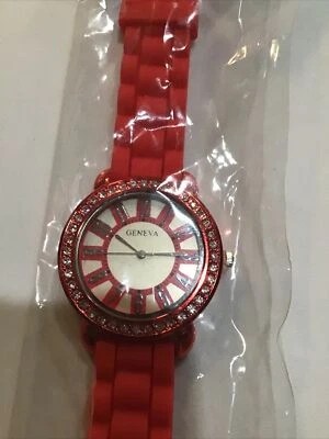 Reloj Geneva Damas Cara Roja y Plateada con Correa de Silicona Roja.Nuevo Sin Etiqueta Foto 1 de 3