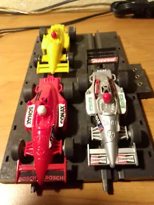 Rennbahn Grand Prix 3 Fahrzeuge konvolut schienen kurven travo usw - Bild 1 von 9
