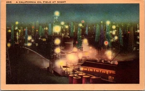 California CA Pumping Oil Wells Fields Night Lights 1940s Postcard - Picture 1 of 2