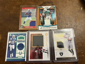 NFL Trikot Relic Lot (5) Carr /49, Johnson /99, Campbell RC, Jones, R. Jones GW - Bild 1 von 6