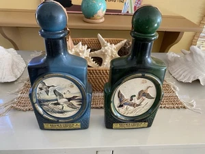 Par de decantadores de whisky Jim Beam J. Lockhart de colección con respaldo de lona de pato, azul en muy buena condición - Imagen 1 de 12