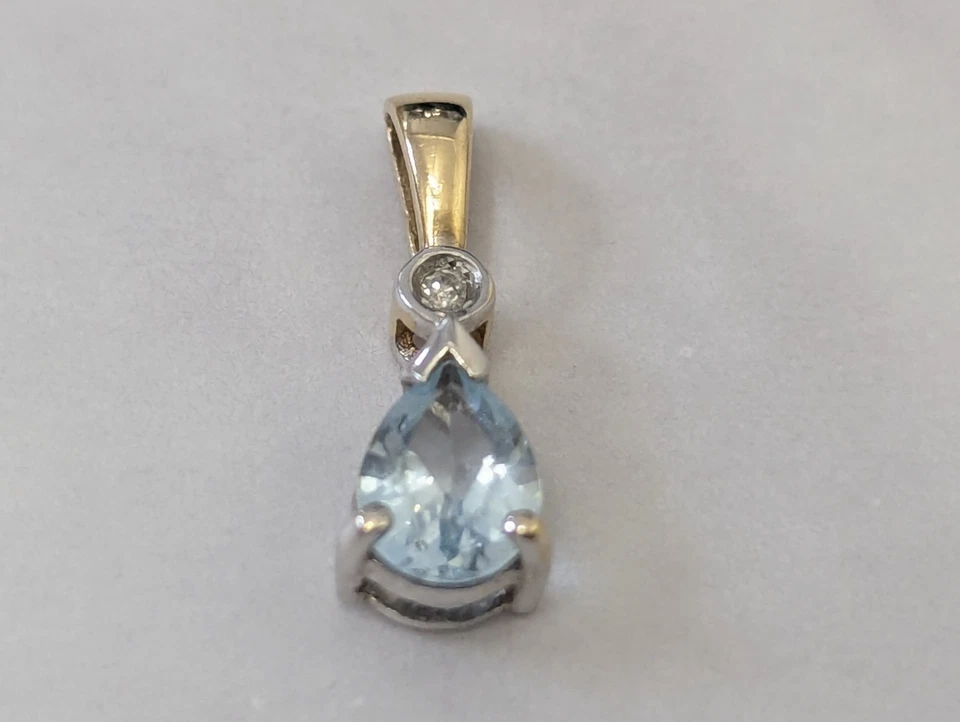 Collar colgante de oro amarillo de 9 quilates con piedras de topacio y diamantes con sello de 5 mm x 16 mm Foto 1 de 4