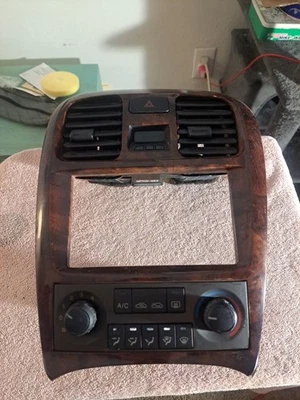 2002-2005 Hyundai Sonata Radio Bezel Trim Woodgrain Manual Climate HVAC 2003 04 - Image 1 of 4