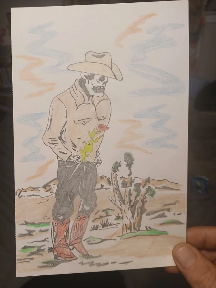 Calavera de vaquero con rosa en dibujo del desierto Foto 1 de 1