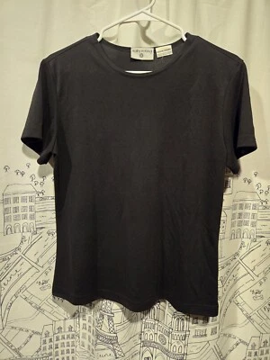 Blusa Kathy Ireland negra vintage usada en excelente estado para mujer  Foto 1 de 4