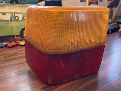 Freno trasero izquierdo Hella OEM Audi 4000, lente señal de giro  Foto 1 de 4