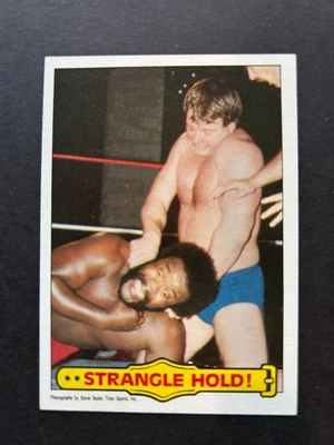 1985 Topps WWF Wrestling "Strangle Hold!" #40 Rowdy Piper/Junkyard Dog - Image 1 of 2
