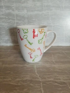 G. Wurm - großer Kaffeebecher -Tasse, Schlüssel bunt - Bild 1 von 3