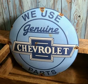 Vintage We Use Genuine Chevrolet Parts Porcelain Metal Dealer Sign Chevy Logo - Picture 1 of 3