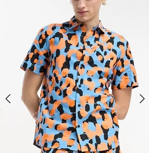 Camisa pequeña con estampado animal brillante hecha en Kenia de Asos NUEVA CON ETIQUETAS PRECIO DE VENTA SUGERIDO POR EL FABRICANTE 25 £ - Imagen 1 de 2