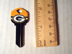 Green bay Packers  NFL Greenbay Metal Blank Key  Image all over OOP - Picture 1 of 2