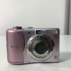 Canon PowerShot A1100 IS 12.1 MP Digital Camera English-- RARE PINK - Picture 1 of 5