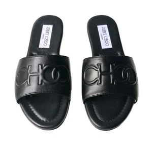 Zapatos mules JIMMY CHOO 'Tiaret' de cuero negro con logotipo CHOO en relieve planos punta abierta - Imagen 1 de 7