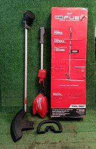 Milwaukee 3016-21ST M18 Decespugliatore a batteria 18 Volt CARBURANTE 16" con QUIK-LOK - solo utensile - Foto 1 di 16