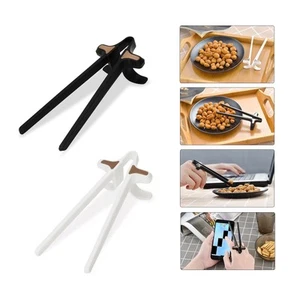 Neu Upgrade 2 Stck. Finger Essstäbchen für Gamer, Snack Clips, Videospiel Party Su... - Bild 1 von 7