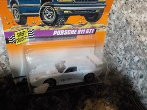 MATCHBOX STREET CRUISERS PORSCHE 911 GT1 WHITE 1/64 - Picture 1 of 2