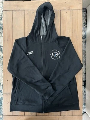 Sudadera con capucha New Balance Dry Travel para mujer manga media larga negra  Foto 1 de 3