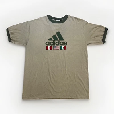 Vintage 1990s Adidas Beige And Green Flags Size L T-Shirt New w/ Tags - Image 1 of 4