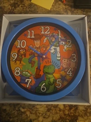 Disney Pixar Toy Story 10" Reloj de Pared Buzz Woody Slinky Nuevo  Foto 1 de 3