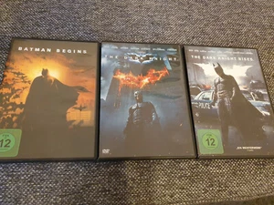 Batman Begins, The Dark Knight, The Dark Knight Rises auf 3 DVDs - Bild 1 von 2