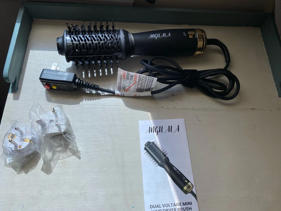 Dual Voltage Hair Dryer Brush 110-250V w/ EU/UK Plug Adapter - Worldwide Use - Image 1 of 1