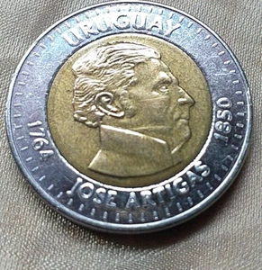 MONEDAS DEL  MUNDO URUGUAY 2000 JOSE ARTIGAS 10 PESOS - Imagen 1 de 2