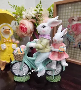 Easter Bunny Rabbit Riding Scooter Pastel Statue Figurine Tabletop Decor 8.5" - Picture 1 of 7