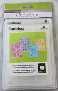 Provo Craft Cuttlebug Embossing Folders COUNTRY LIFE 200472 Guitars/Corn/Laundry - Picture 1 of 3